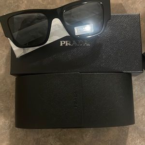 Men Prada sunglasses, black with silver trim,
